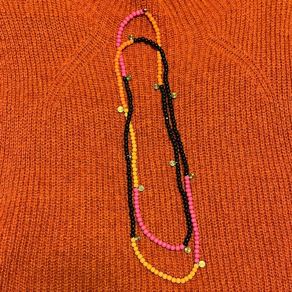Gudrun Sjoden beads - orange, pink, black, with spiral metal accent beads